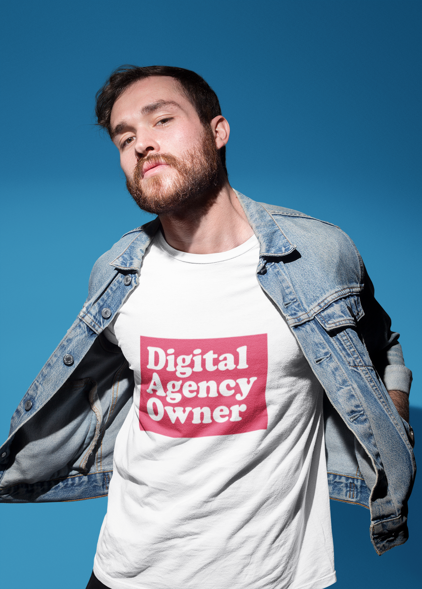 Man wearing a t-shirt with 'Digital Agency Owner' text against a blue sky