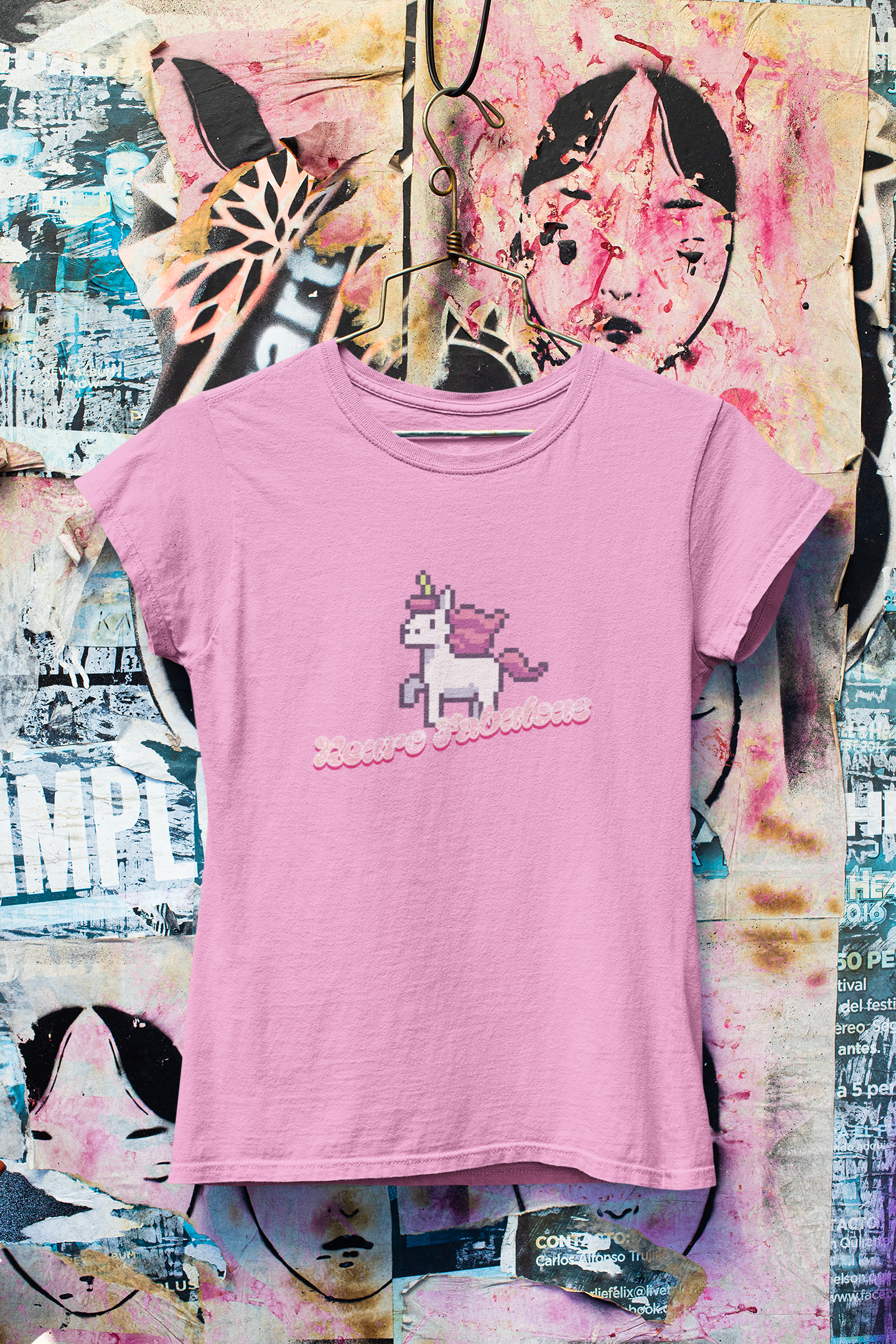 Neurofabulous T-Shirt  Pink t-shirt with a unicorn graphic on a colorful graffiti background