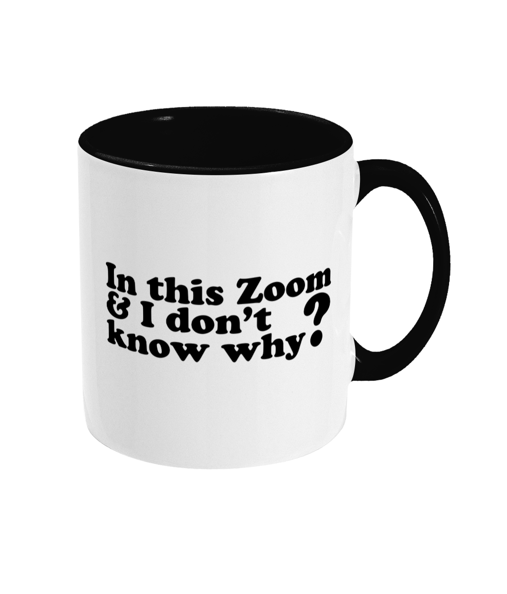 White mug with black interior and handle, featuring text on a white background