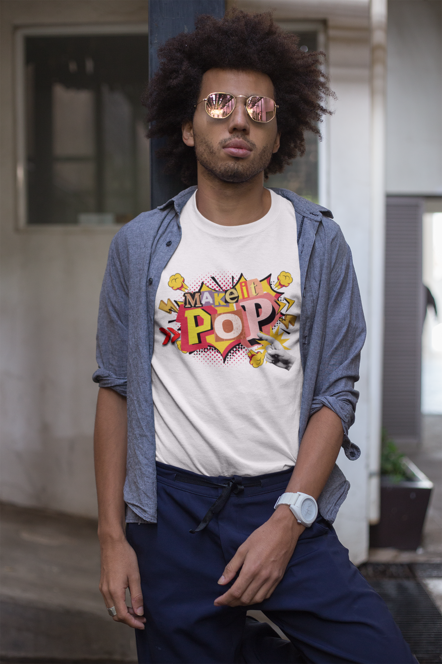 Tshirt with colorful 'Make it Pop' design on a white background