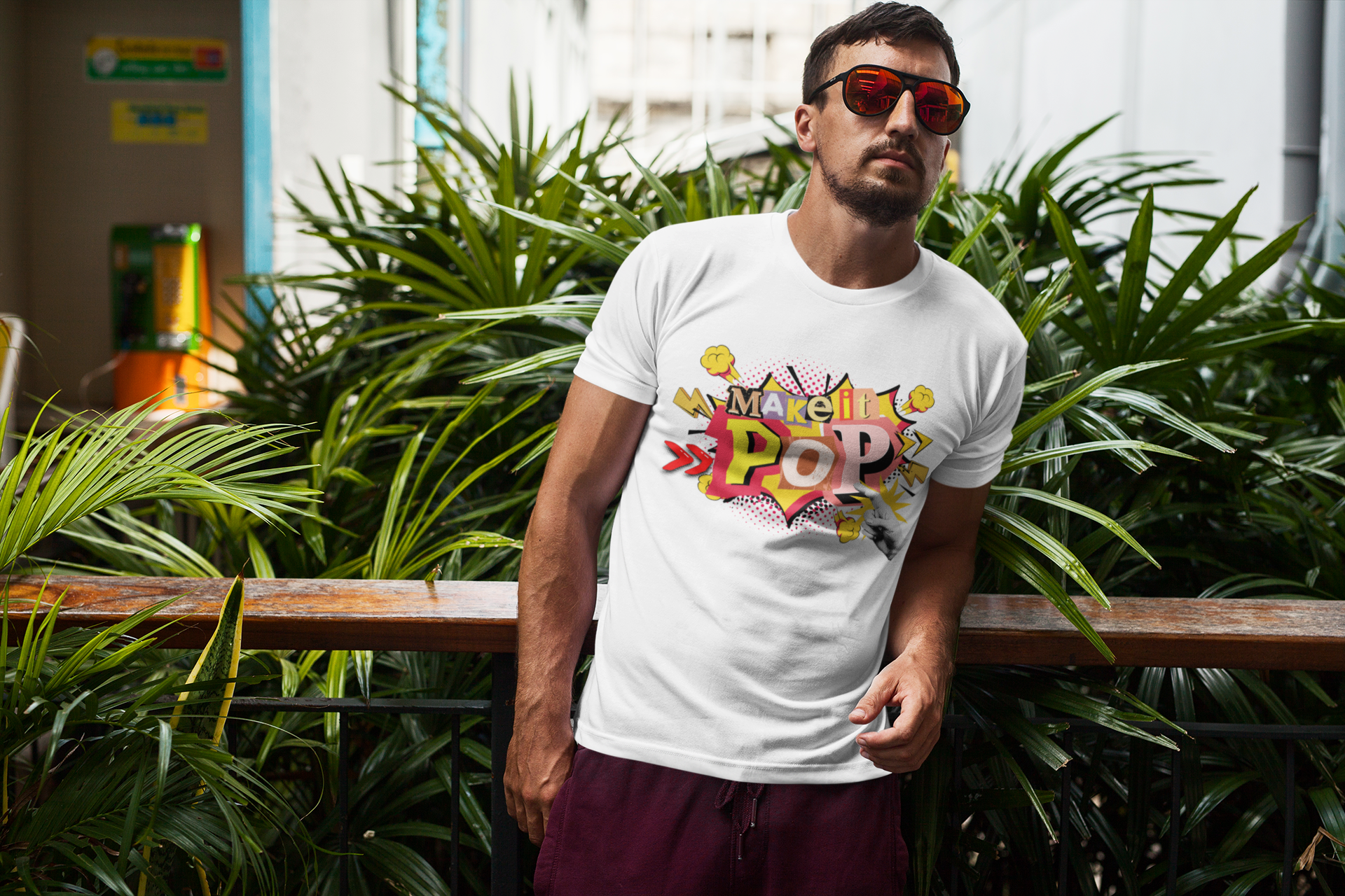 Tshirt with colorful 'Make it Pop' design on a white background