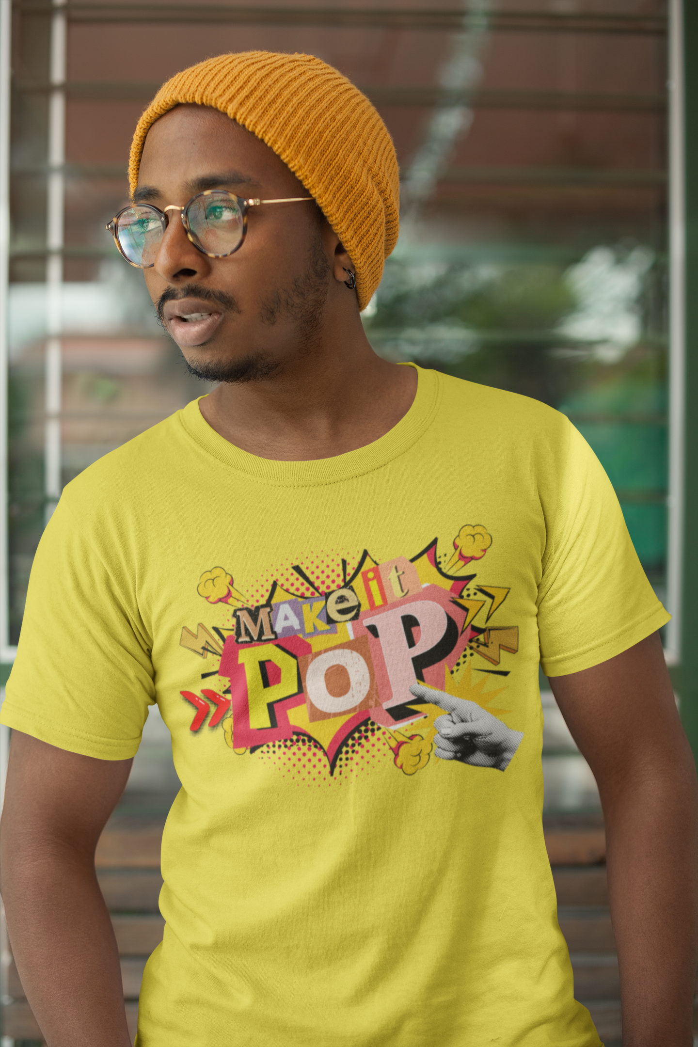 Tshirt with colorful 'Make it Pop' design on a white background