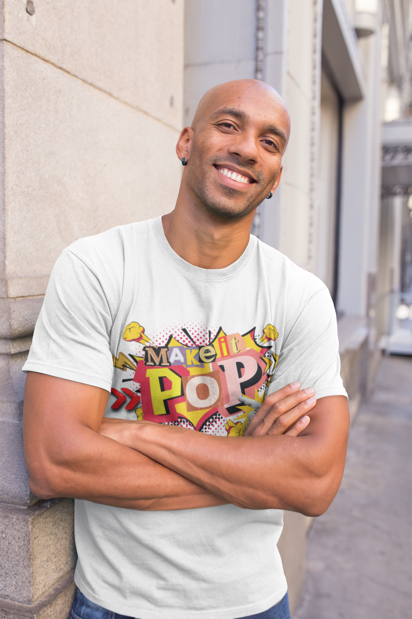 Tshirt with colorful 'Make it Pop' design on a white background