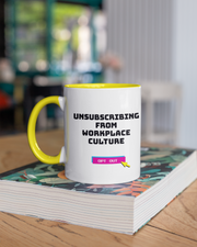 Mug with 'Unsubscribing from Workplace Culture' text on a stack of books