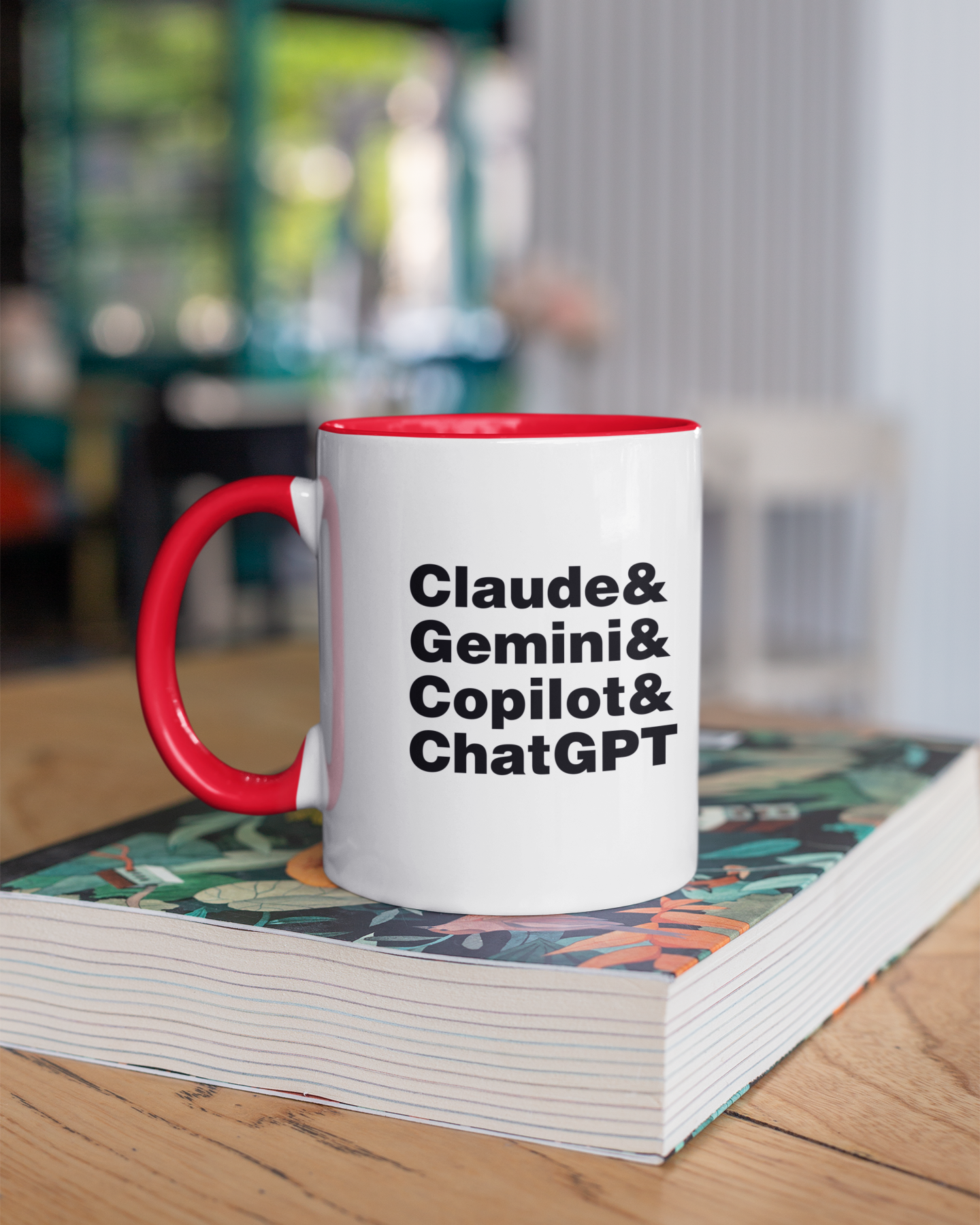 Mug with text 'Claude & Gemini & Copilot & ChatGPT' on a stack of books.