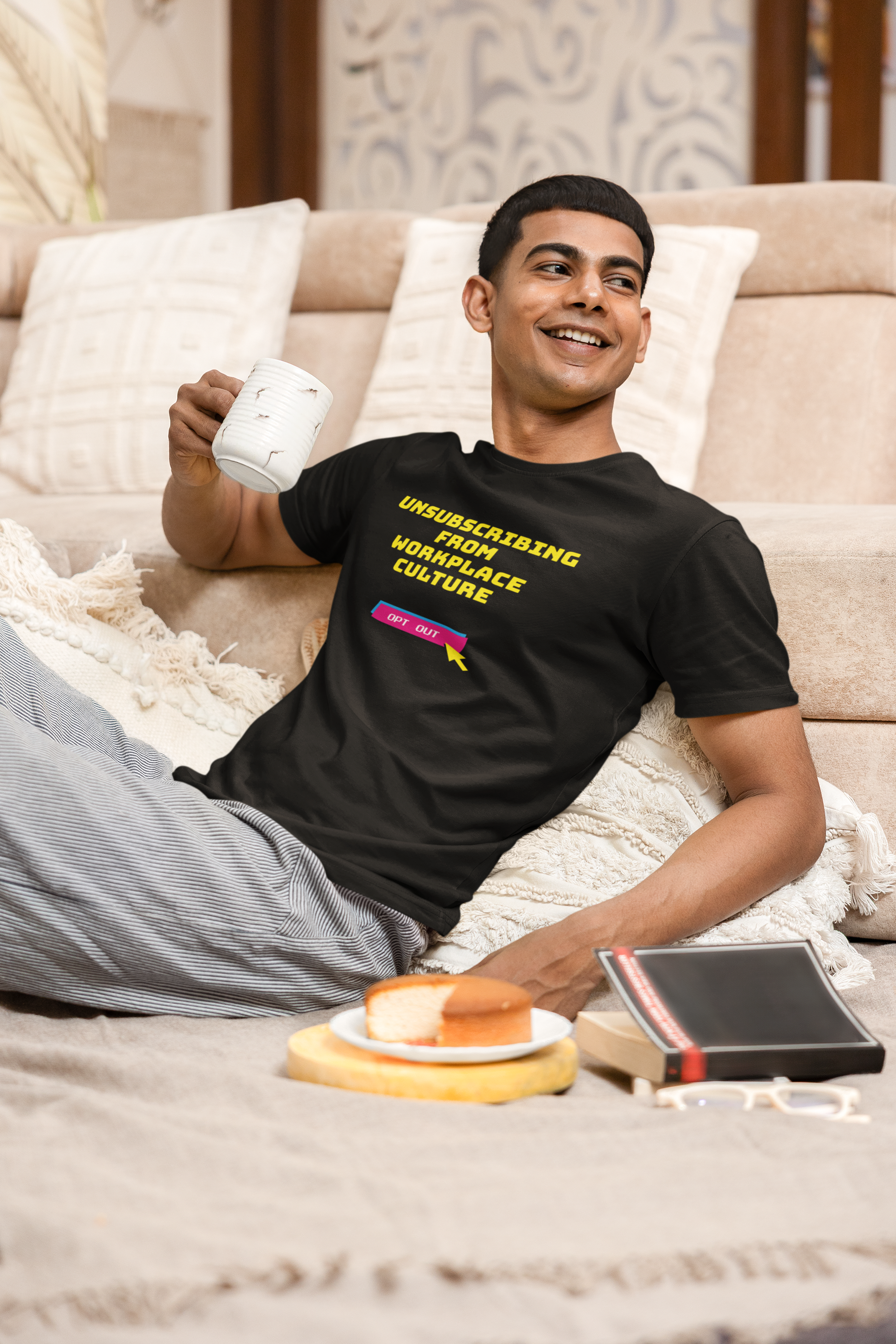 Unsubscribing from workplace culture t-shirt man on sofa ethical graphic tee