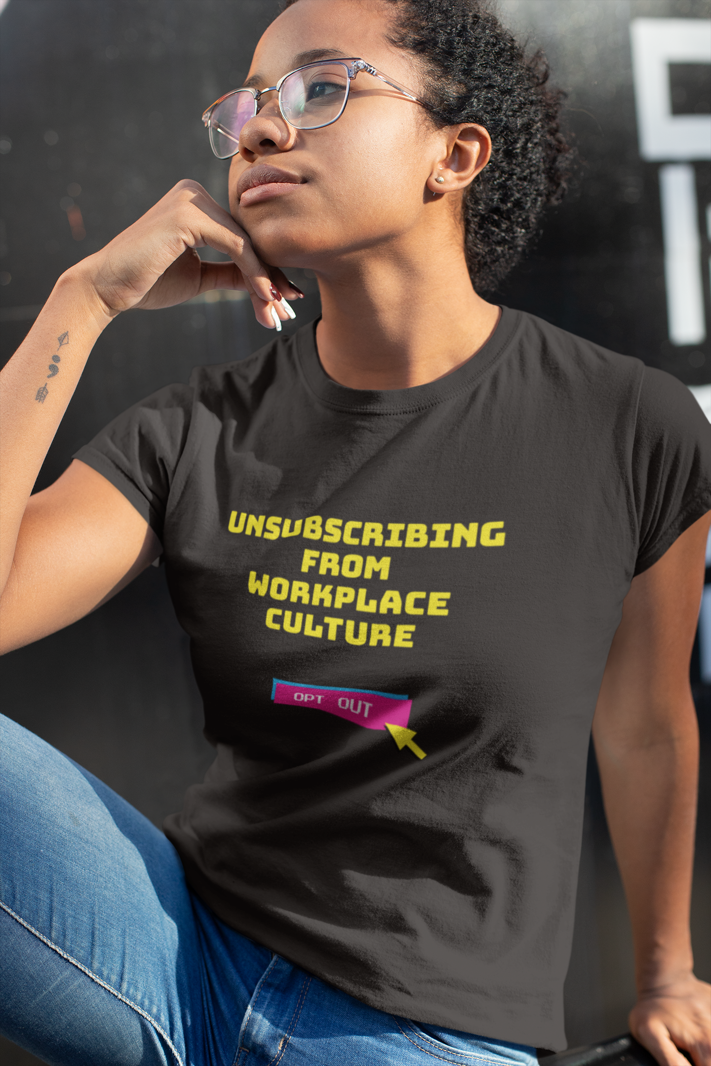 Unsubscribing from workplace culture t-shirt woman on sofa ethical graphic tee